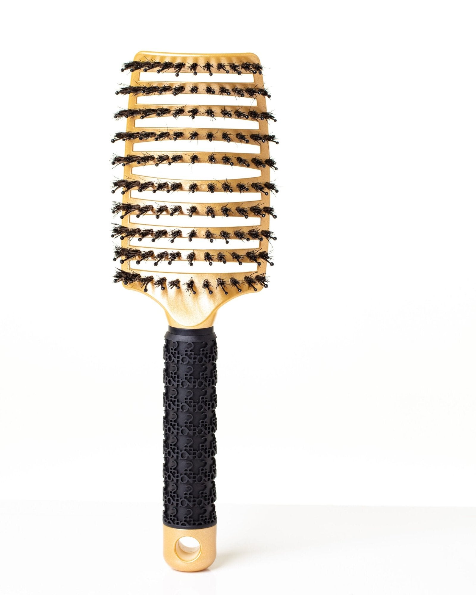 Golden-colored hair comb from the front