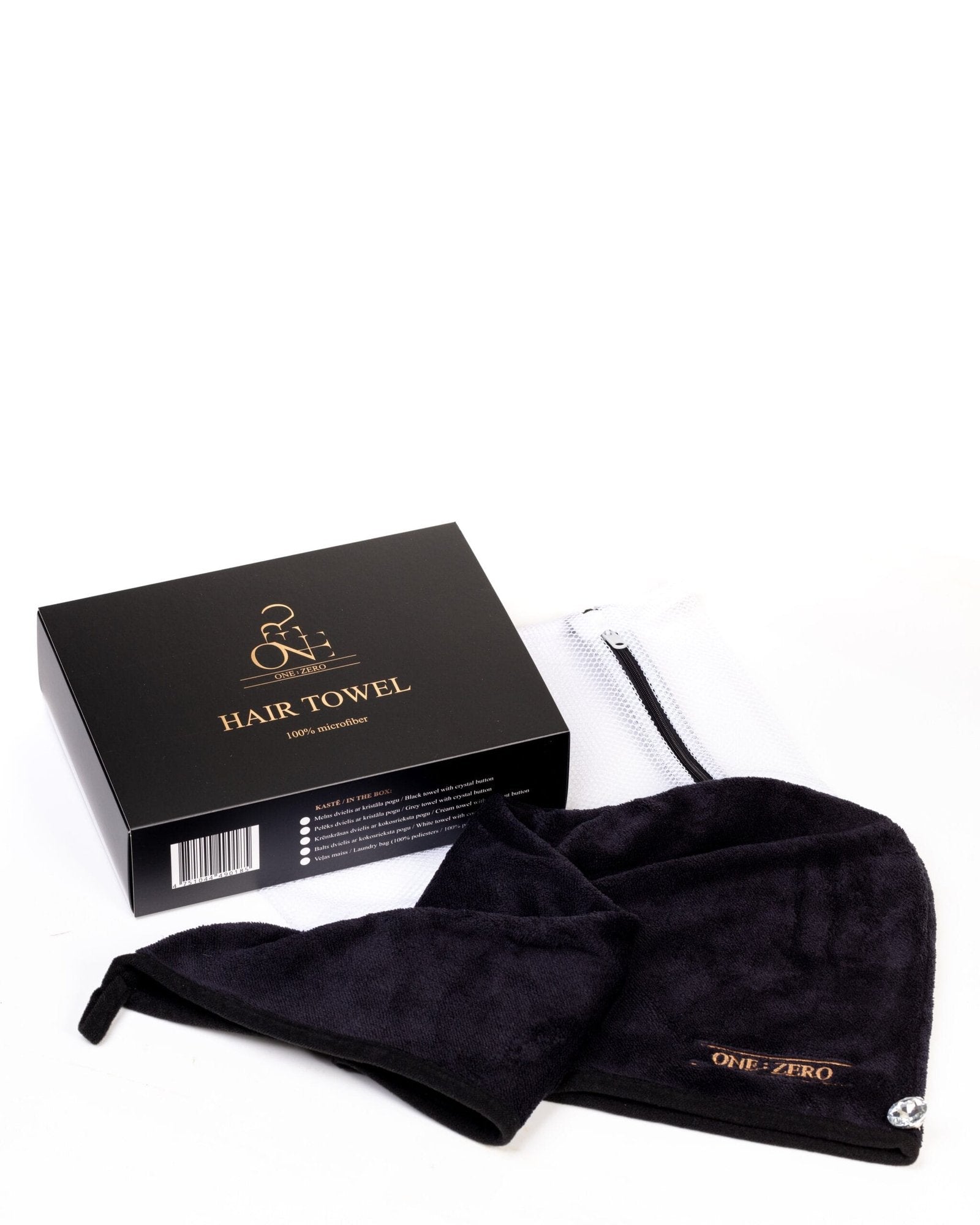 Black hair towel with a crystal button next to the gift box