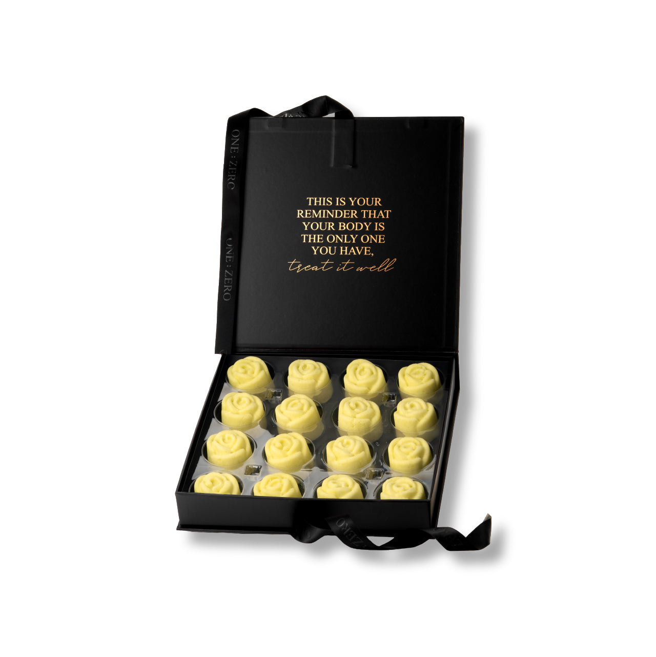 Solid body scrubs in the shape of yellow roses in a gift box