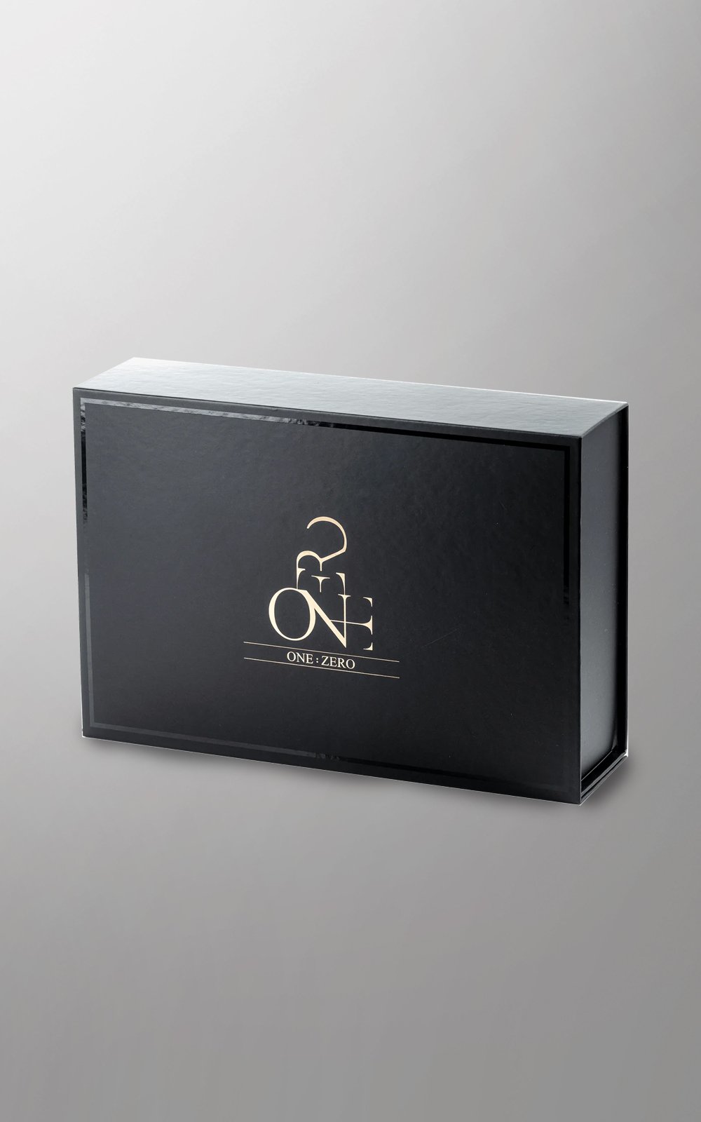 Black ONE:ZERO gift box with a gilded logo