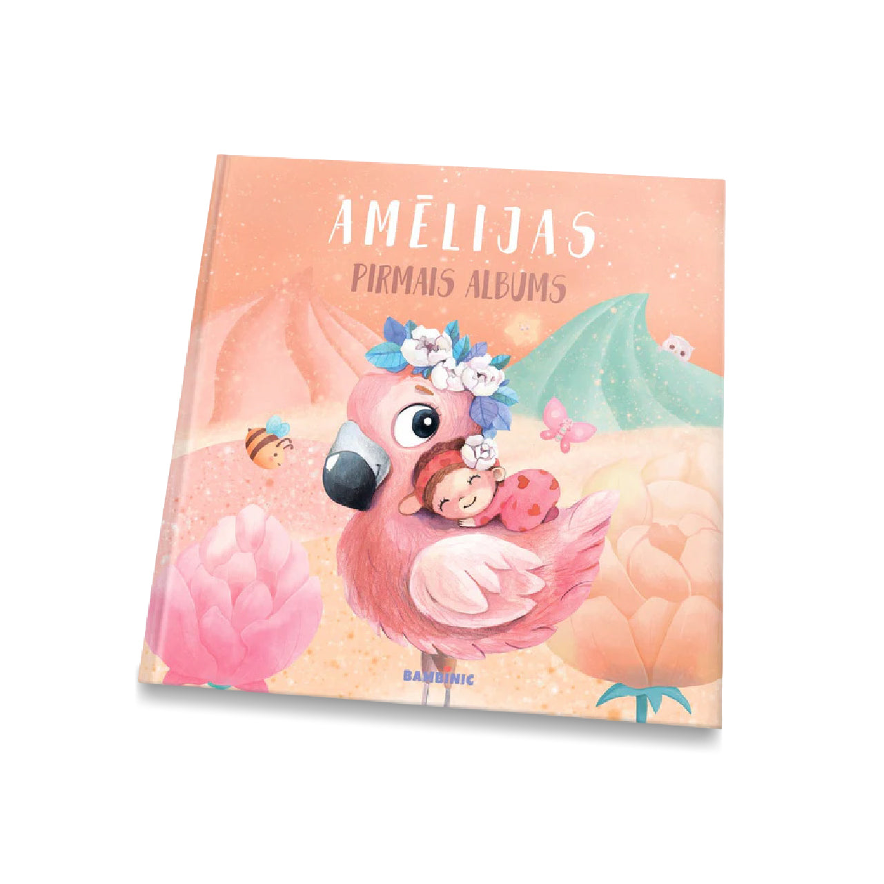 The girl's first album with a pink cover and flamingo illustration