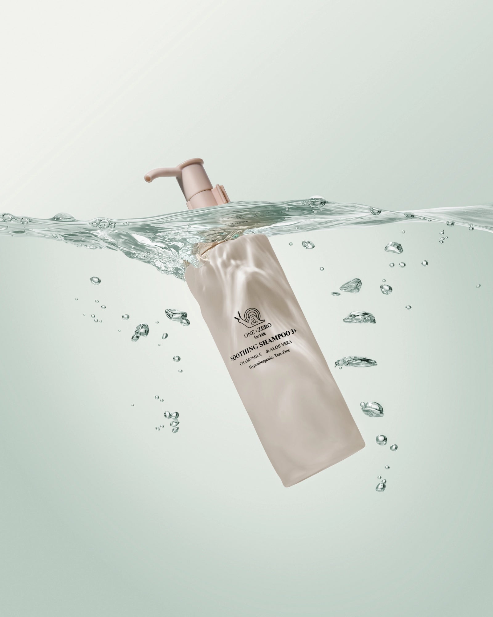 A bottle of children's shampoo in water with bubbles